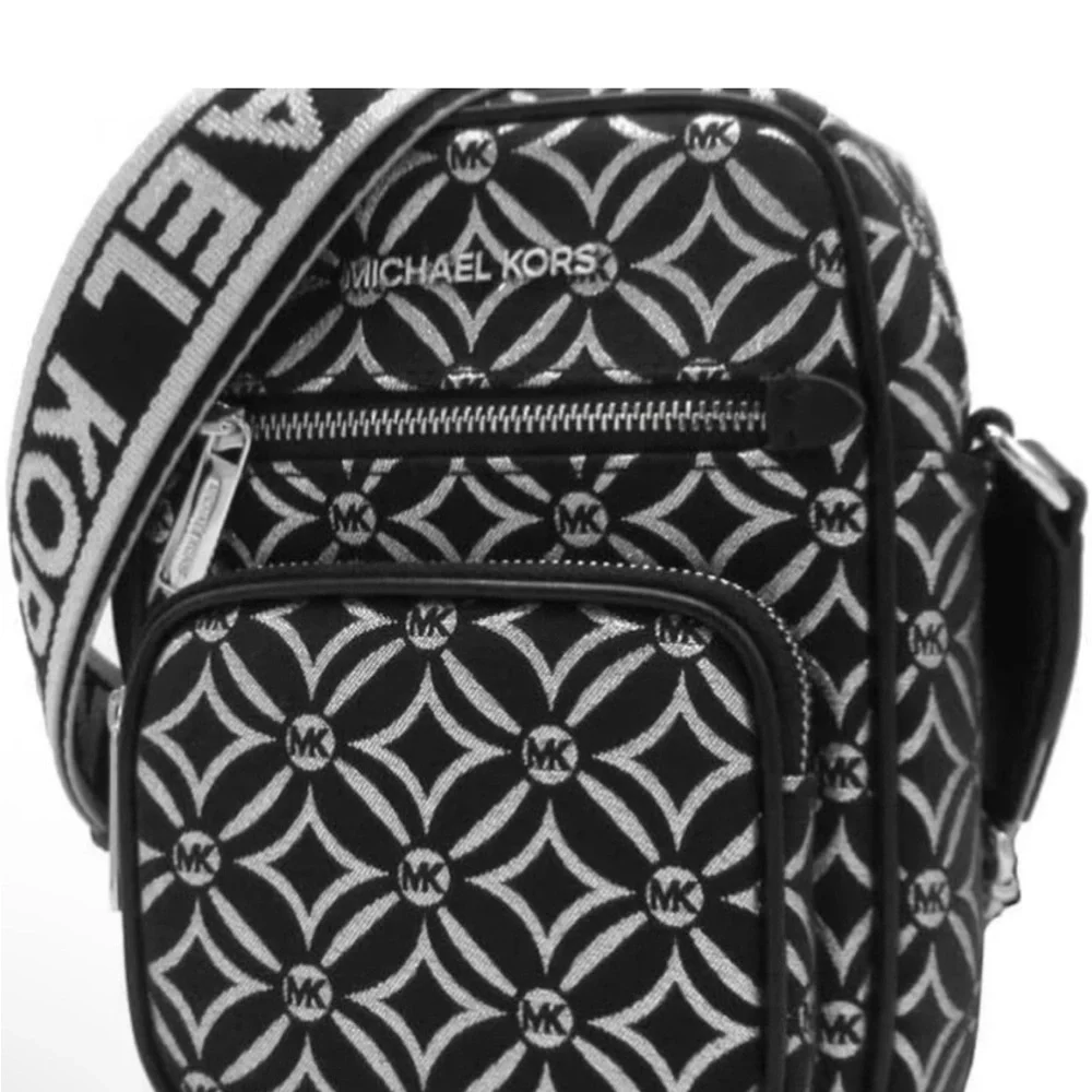 Michael Kors NWT Jet Set black and silver crossbody with guitar strap, NWT